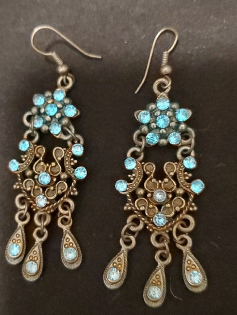 Elegant Turquoise Crystals on an Intricate Brass Filigree